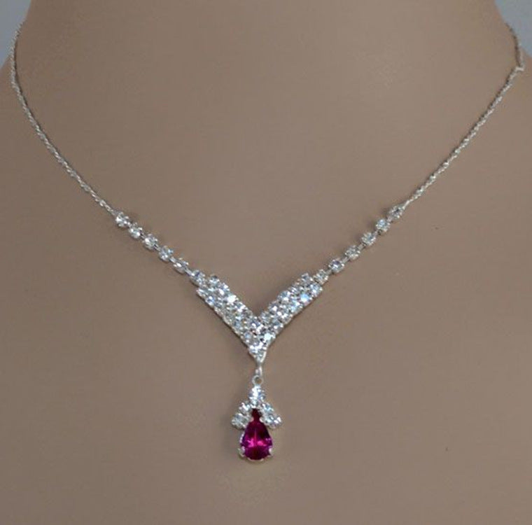 Blue zirconia necklace from Spacewallart with a delicate chain and sparkling blue gemstone pendant.