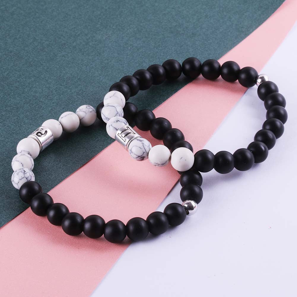 Black agate and white turquoise couple bracelets, stylish accessories from Spacewallart featuring natural stone beads.