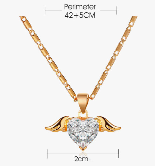 Heart wings necklace from Spacewallart featuring a delicate silver chain and a pendant with heart and wing design.