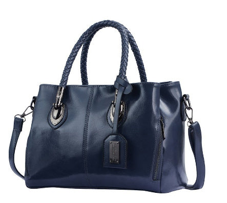 Vintage oil wax leather luxury handbag by Spacewallart, showcasing a textured, stylish accessory with elegant craftsmanship.