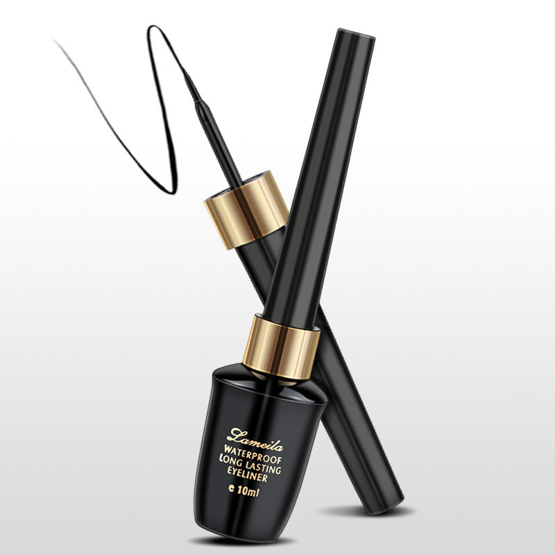 Spacewallart liquid eyeliner in sleek black tube, showcasing smooth applicator and bold makeup look for eye definition.