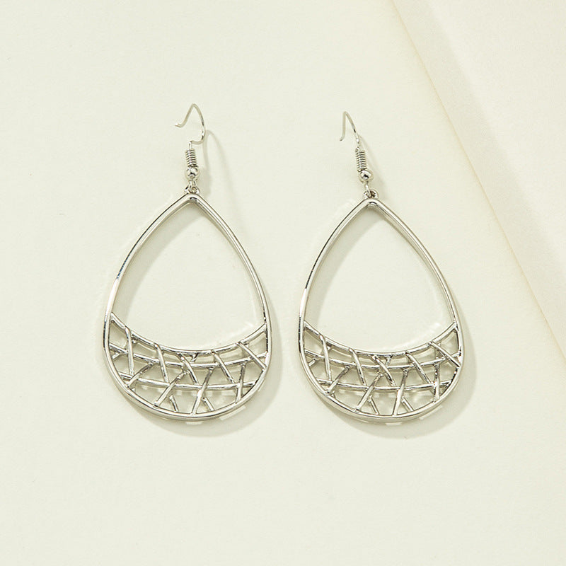 Silver geometric earrings with modern cube and triangle shapes, stylish accessories by Spacewallart.