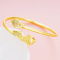 Gold copper bracelet from Spacewallart accessories collection, featuring a sleek and polished design with intricate detailing.