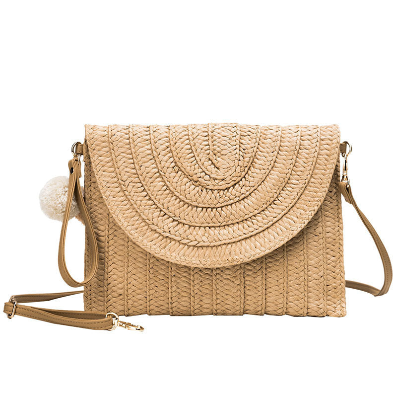 Hand woven bag from Spacewallart featuring natural fibers and intricate craftsmanship, perfect for stylish accessories.