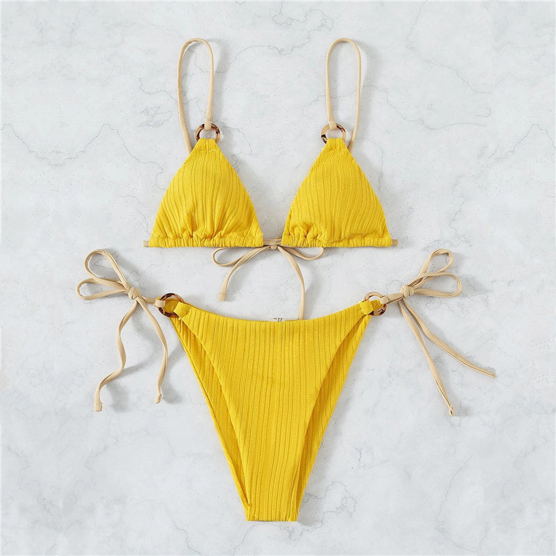 Solid color strap bikini swimsuit by Spacewallart, featuring a two-piece design with adjustable straps and a sleek, minimal style.