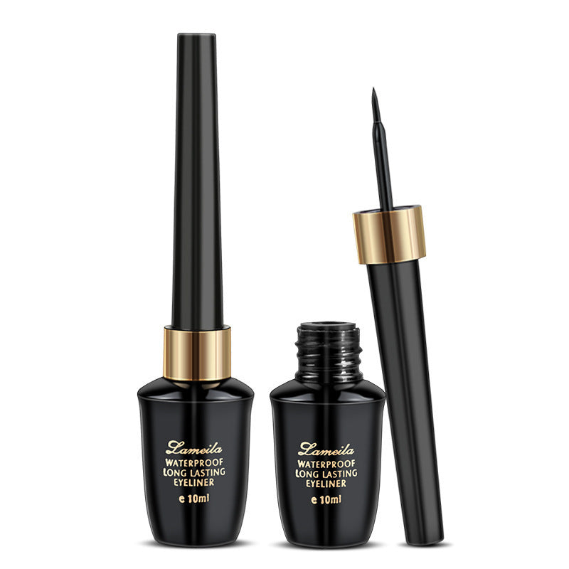 Spacewallart liquid eyeliner in sleek black tube, displaying precise applicator and vibrant black liquid for flawless eye makeup.