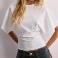 Summer Batwing Sleeve T-shirt by Spacewallart featuring loose fit and lightweight fabric, displayed on a hanger.