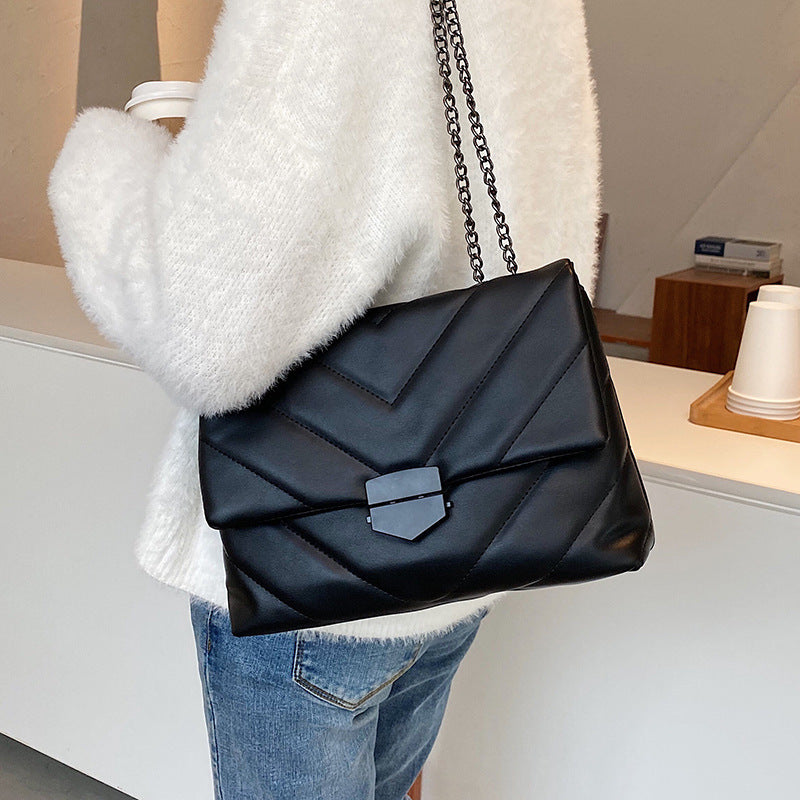 Small PU leather crossbody bag by Spacewallart featuring a compact design and adjustable strap, perfect for everyday accessories.