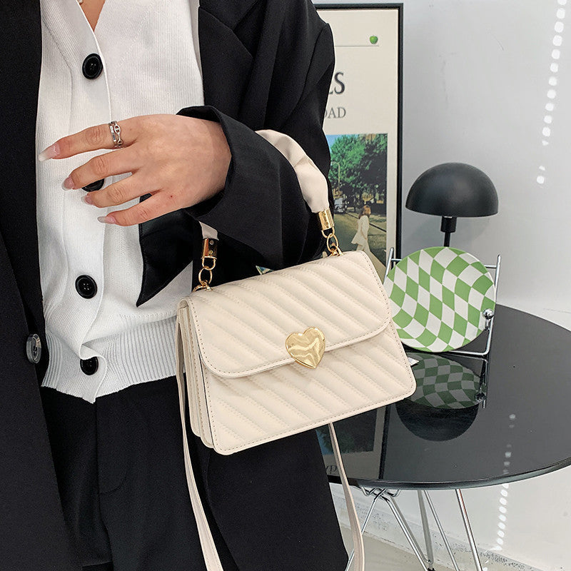 Spacewallart chain shoulder bag accessory featuring a stylish design with a metal chain strap and compact shape.