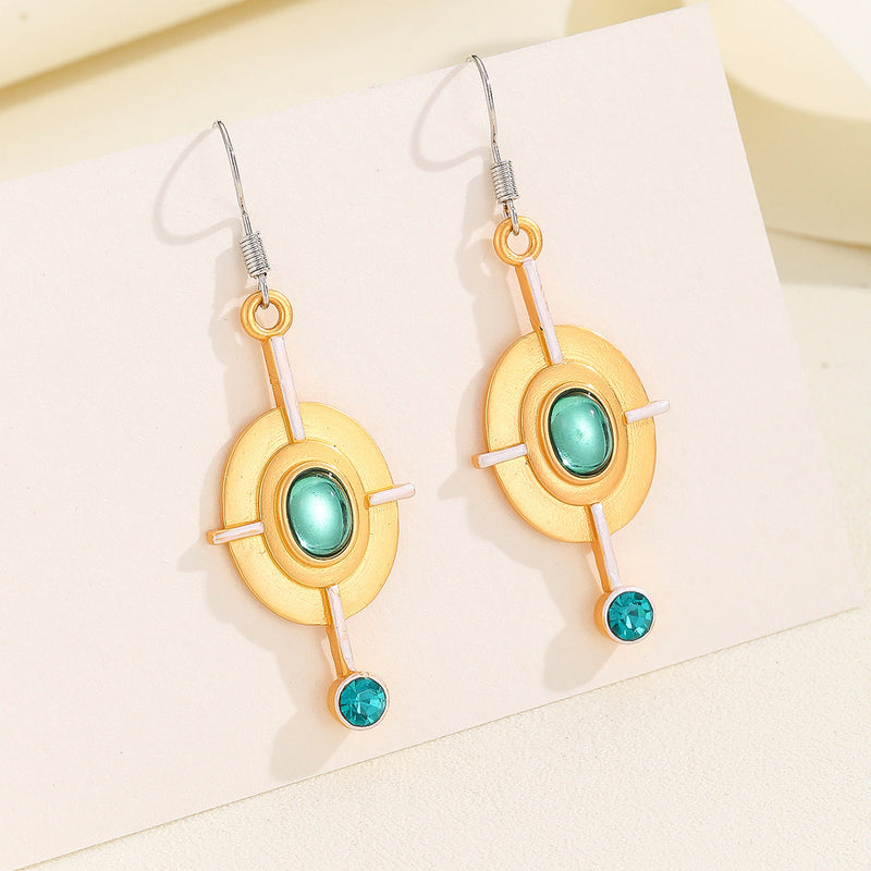 Retro oval earrings by Spacewallart featuring vintage-inspired design with smooth, polished surfaces and elegant shape.