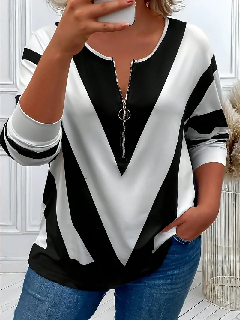 Spacewallart BERI sweater, cozy knit apparel in neutral tones, shown on a hanger with a textured background.