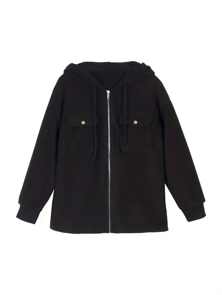 Spacewallart DEFI jacket, stylish black apparel with modern design, displayed on a hanger against a neutral background.