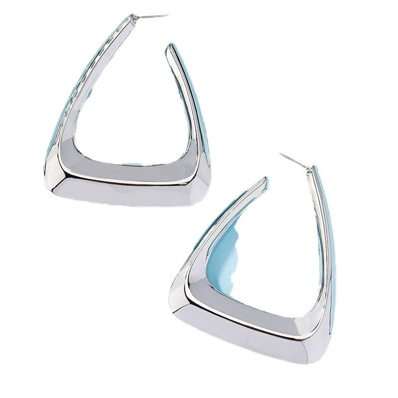 Silver metal earrings for women, stylish accessories by Spacewallart, featuring a sleek, modern design.
