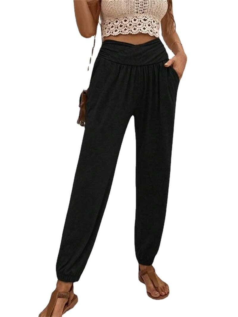 Casual loose-fit ankle-tied trousers with pockets from Spacewallart, featuring a relaxed style and comfortable fabric.