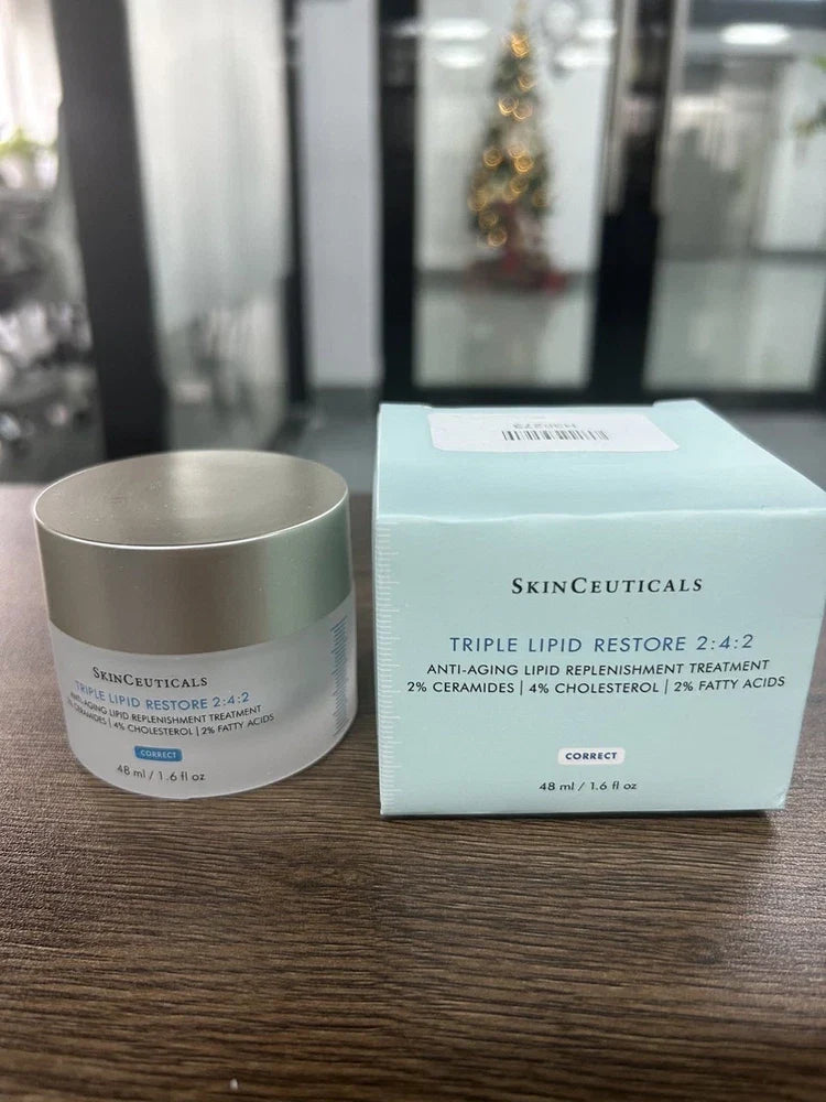 SkinCeuticals Triple Lipid Restore anti-aging face cream in a 1.6 oz jar, featuring a smooth, luxurious skincare formulation.