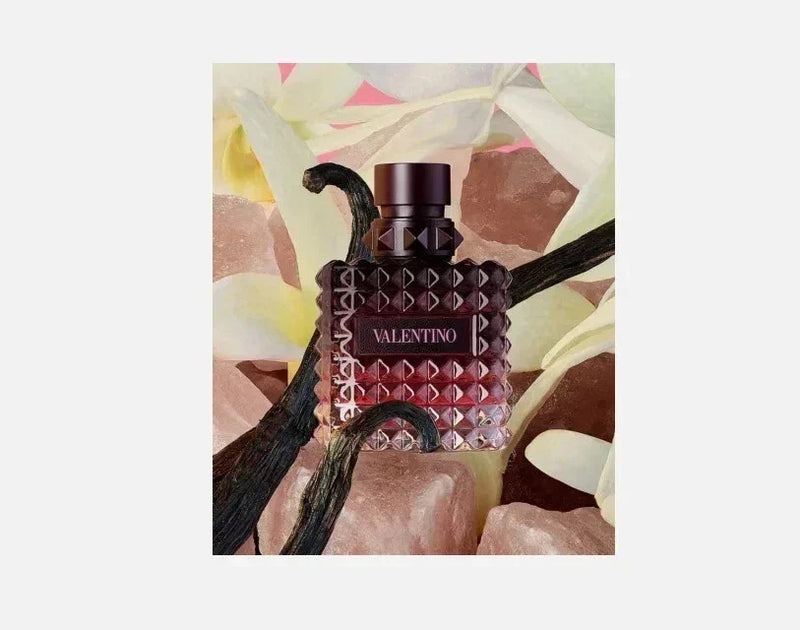 Valentino Donna Born In Roma Intense Eau de Parfum for Women, 3.4 oz, with elegant perfume bottle and floral accents.