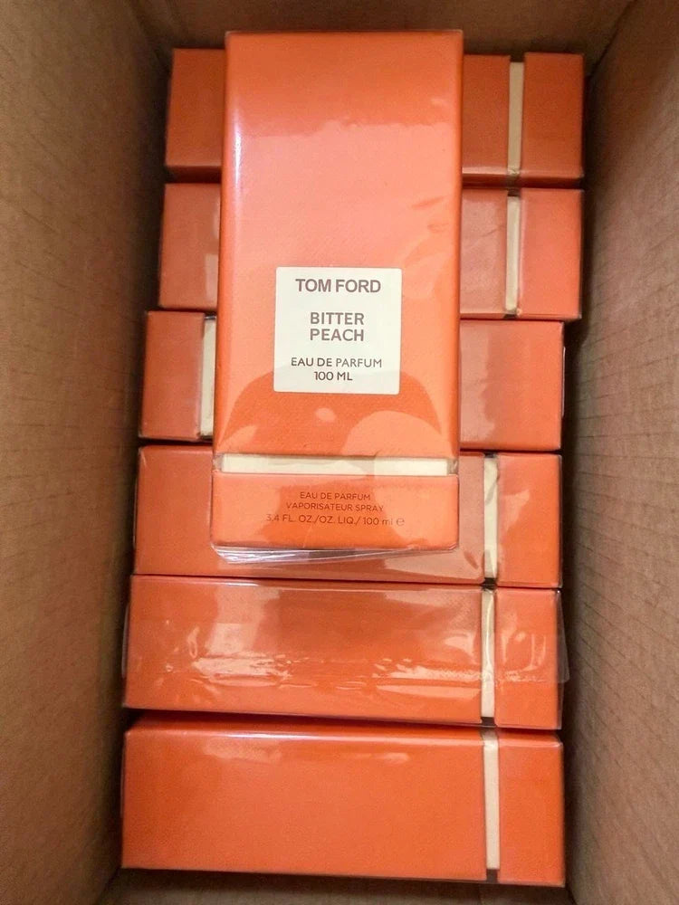 Tom Ford Bitter Peach Eau de Parfum bottle, unisex fragrance in 1.7 oz and 3.4 oz sizes, new and sealed.