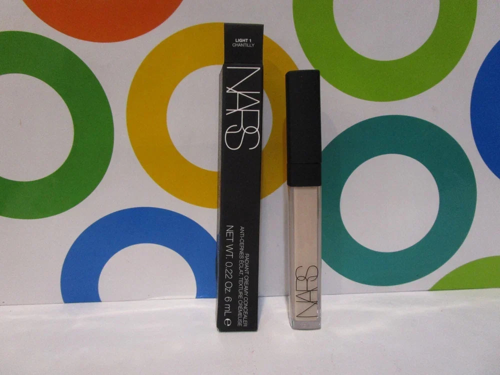 NARS Radiant Creamy Concealer in Light 1 Chantilly, 0.22 oz tube with creamy texture and beige shade, on a plain background.