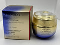 Shiseido Vital Perfection Advanced Cream in 1.7 oz jar, a luxurious uplifting and firming skincare product with a sleek design.