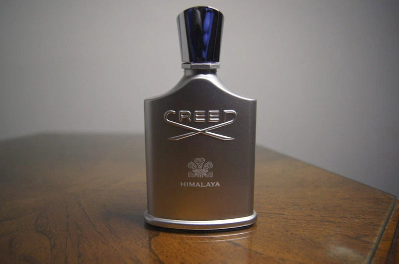 Creed Himalaya Eau de Parfum for Men in 3.3 oz bottle, showcasing sleek packaging and label design.