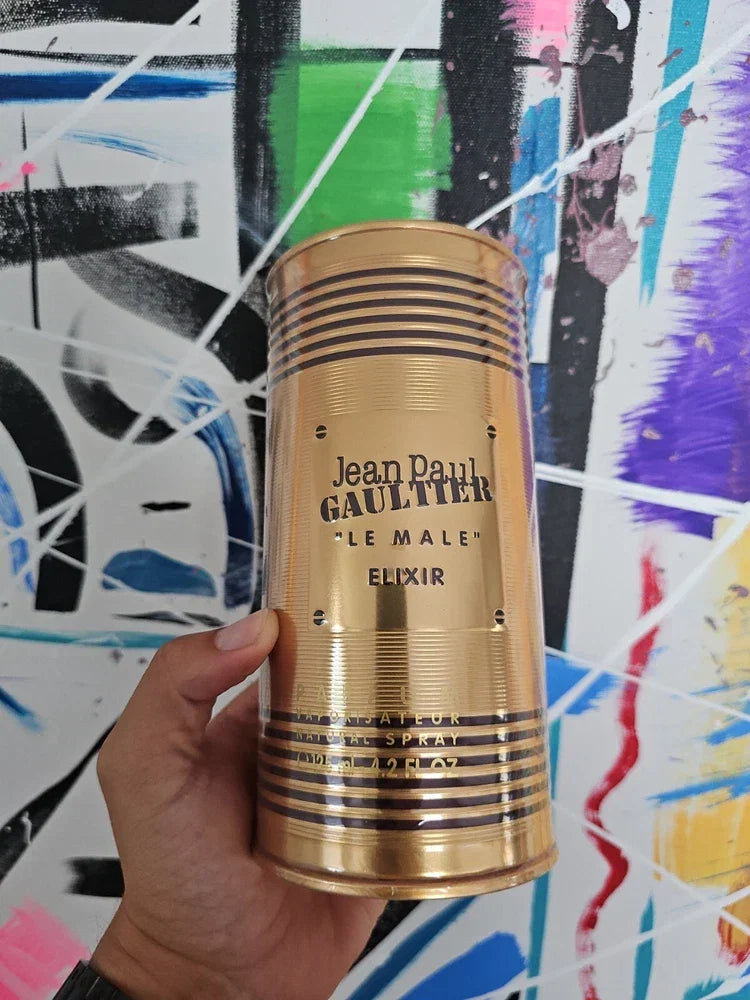 Sealed Jean Paul Gaultier Le Male Elixir Parfum for Men in 4.2 oz bottle, featuring sleek design and brand logo.