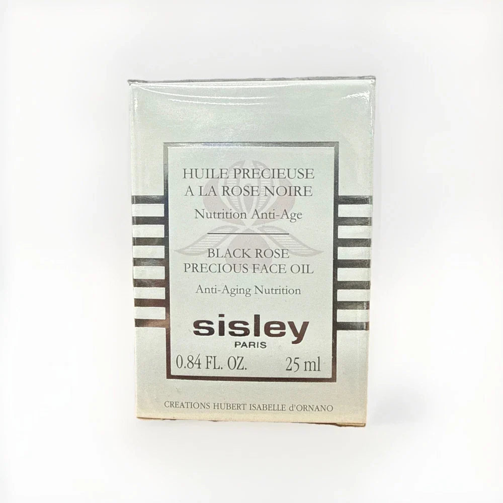 Sisley Black Rose Precious Face Oil bottle with black and gold packaging, 0.84 oz/25ml, displayed on a neutral background.
