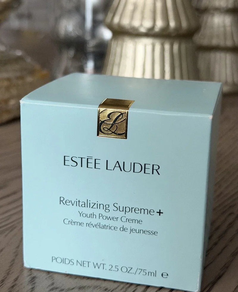 Estée Lauder Revitalizing Supreme+ Youth Power Creme anti-aging moisturizer in 2.5 oz jar, creamy texture, and elegant packaging.