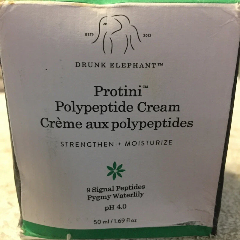Drunk Elephant Protini Polypeptide Moisturizing Cream in 1.69 oz jar, featuring a smooth, creamy texture for skincare.