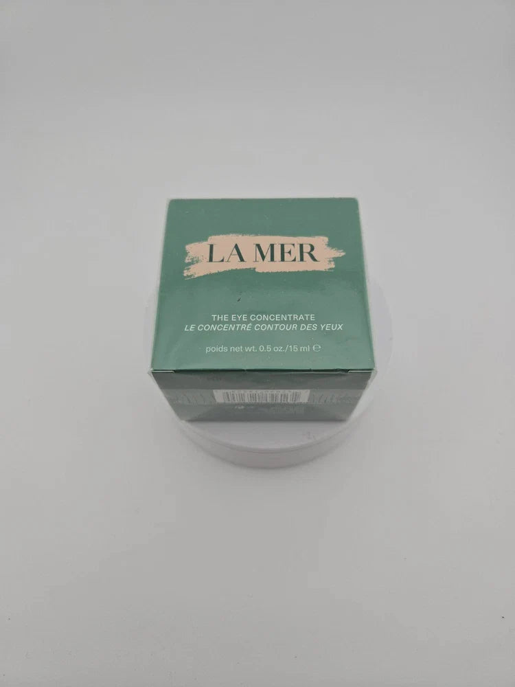 Spacewallart La Mer The Eye Concentrate 0.5 oz beauty product in a sleek jar, designed for nourishing and hydrating sensitive eye areas.