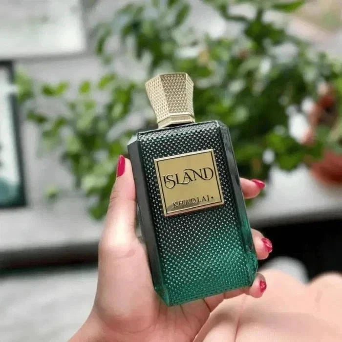 Khadlaj Island Extrait De Parfum Spray for Unisex, 3.4 oz, in a sleek glass bottle with a spray nozzle, on a neutral background.