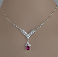 Blue zirconia necklace from Spacewallart with a delicate chain and sparkling blue gemstone pendant.