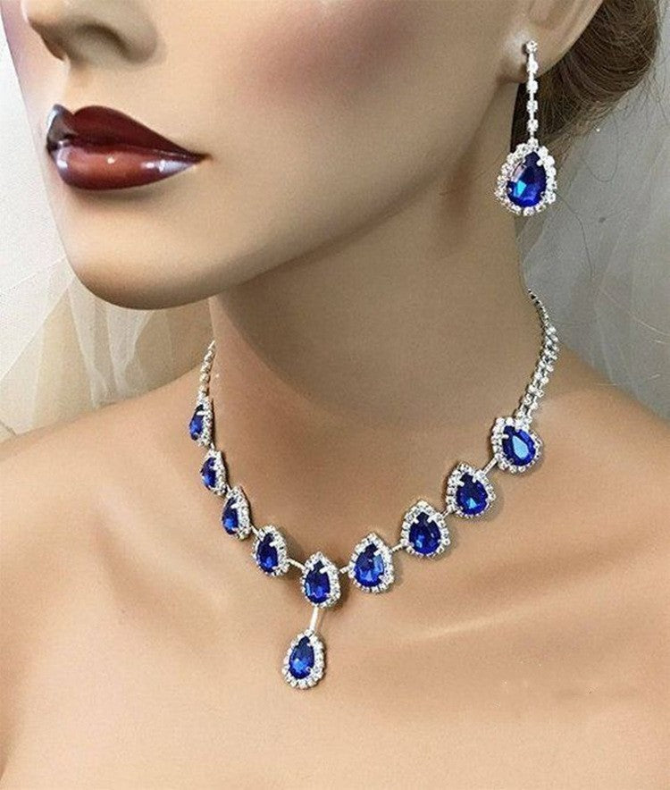 Blue Zirconia necklace from Spacewallart, featuring a delicate chain with a sparkling blue zirconia pendant.