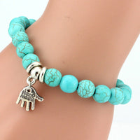 Vintage turquoise bracelet from Spacewallart featuring vibrant blue stones and intricate silver details, stylish accessory for any outfit.