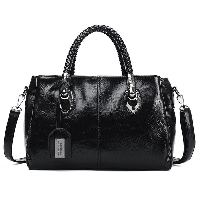 Vintage oil wax leather handbag by Spacewallart, luxury accessory with textured leather finish and elegant design.