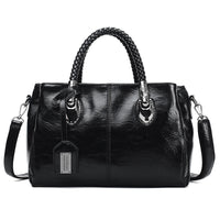 Vintage oil wax leather handbag by Spacewallart, luxury accessory with textured leather finish and elegant design.