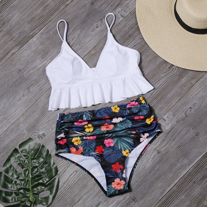 Ruffled navy swimwear by Spacewallart featuring a stylish design and adjustable straps, perfect for beach or poolside wear.