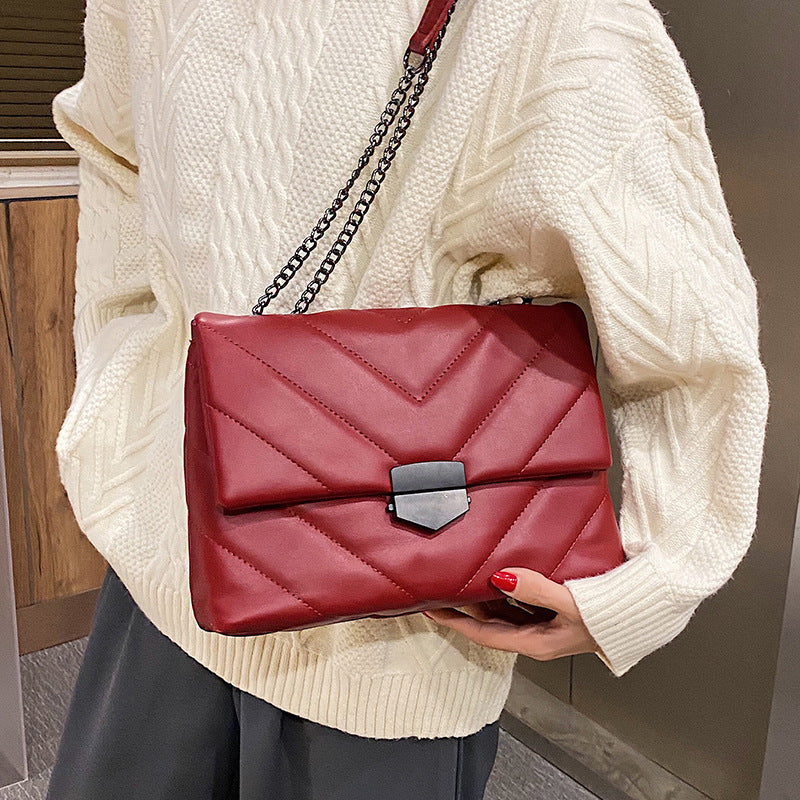 Small PU leather crossbody bag featuring a sleek design, perfect for accessories and everyday use by Spacewallart.