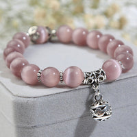 Natural opal beads bracelet featuring vibrant, iridescent gemstones on a delicate accessory from Spacewallart.