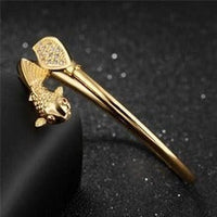Gold color copper bracelet from Spacewallart, showcasing a sleek and stylish accessory with a polished finish.