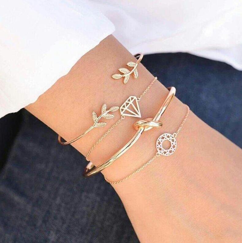 Bohemia leaf knot hand cuff link chain charm bracelet by Spacewallart featuring leaf and knot designs, stylish accessories for men and women.