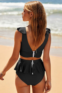 Spacewallart ruffled swimwear apparel featuring a stylish design with ruffle details on a vibrant swimsuit.