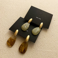 Resin acrylic earrings by Spacewallart, stylish accessories with vibrant, transparent design and modern geometric shapes.