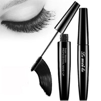 Close-up of Spacewallart thick waterproof mascara wand with black bristles and a sleek tube, emphasizing volumizing and waterproof features.