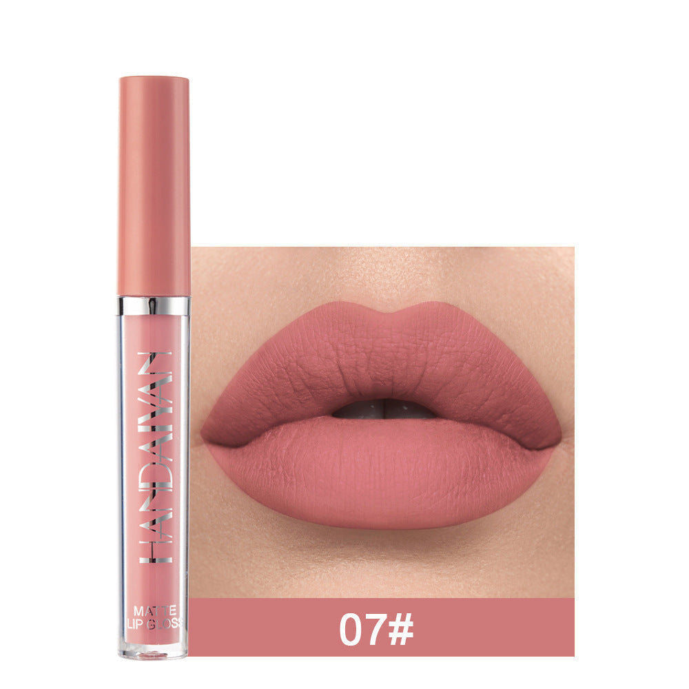 Spacewallart matte non-stick cup lip gloss in a sleek container, showcasing its smooth, glossy finish for beauty and lip care.