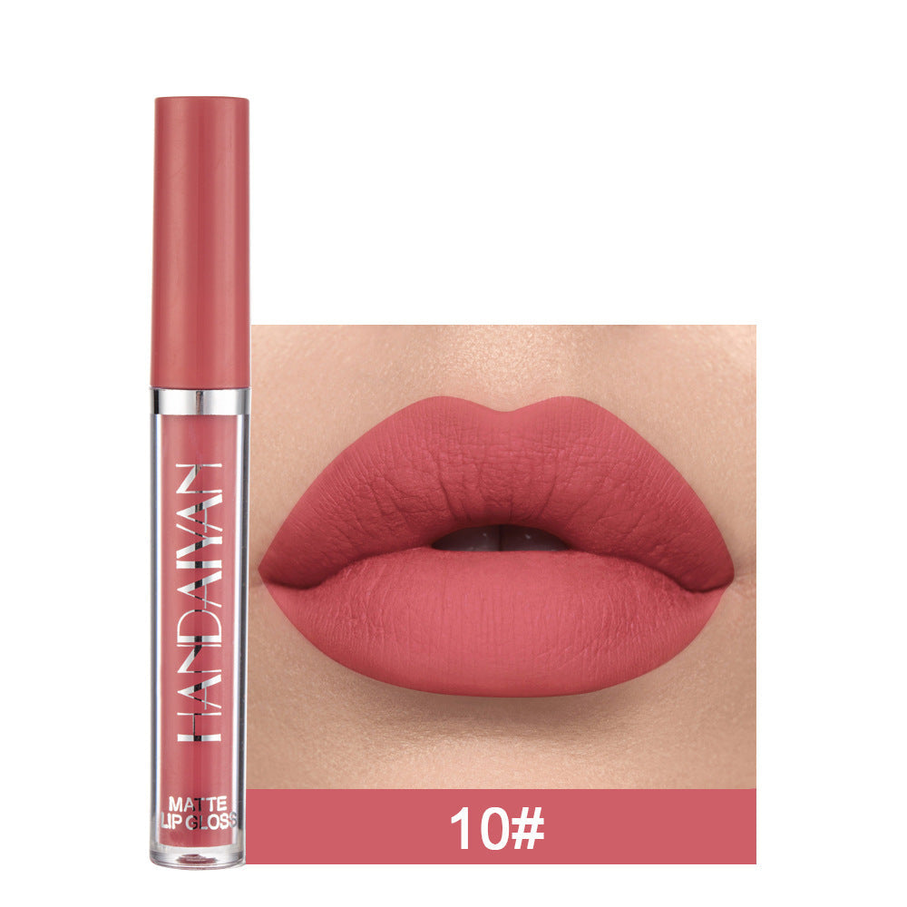 Spacewallart matte non-stick cup lip gloss in a sleek container, showcasing its smooth, matte finish and compact design for beauty use