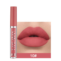 Spacewallart matte non-stick cup lip gloss in a sleek container, showcasing its smooth, matte finish and compact design for beauty use