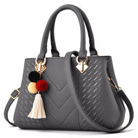 Luxury ladies handbag by Spacewallart, stylish accessory with elegant design, leather material, and spacious interior.
