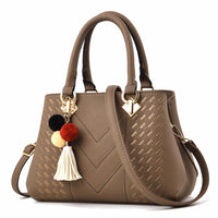 Luxury ladies handbag by Spacewallart featuring elegant design and high-quality accessories in a stylish accessory image.