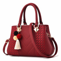 Luxury ladies handbag from Spacewallart featuring elegant design, leather material, and stylish accessory appeal.