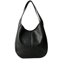 Vintage women's handbag by Spacewallart featuring a leather design and classic accessories style.